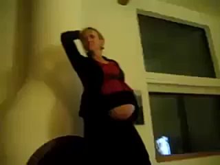 big pregnant woman dancing