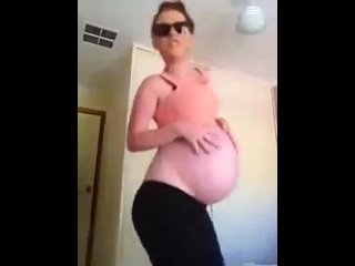 preggo in sunglasses dancing